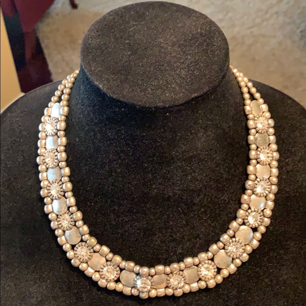 Silver colored metal necklace w/rhinestones.